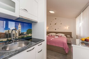 Studio (Studio Apartment) | Private kitchen | Fridge