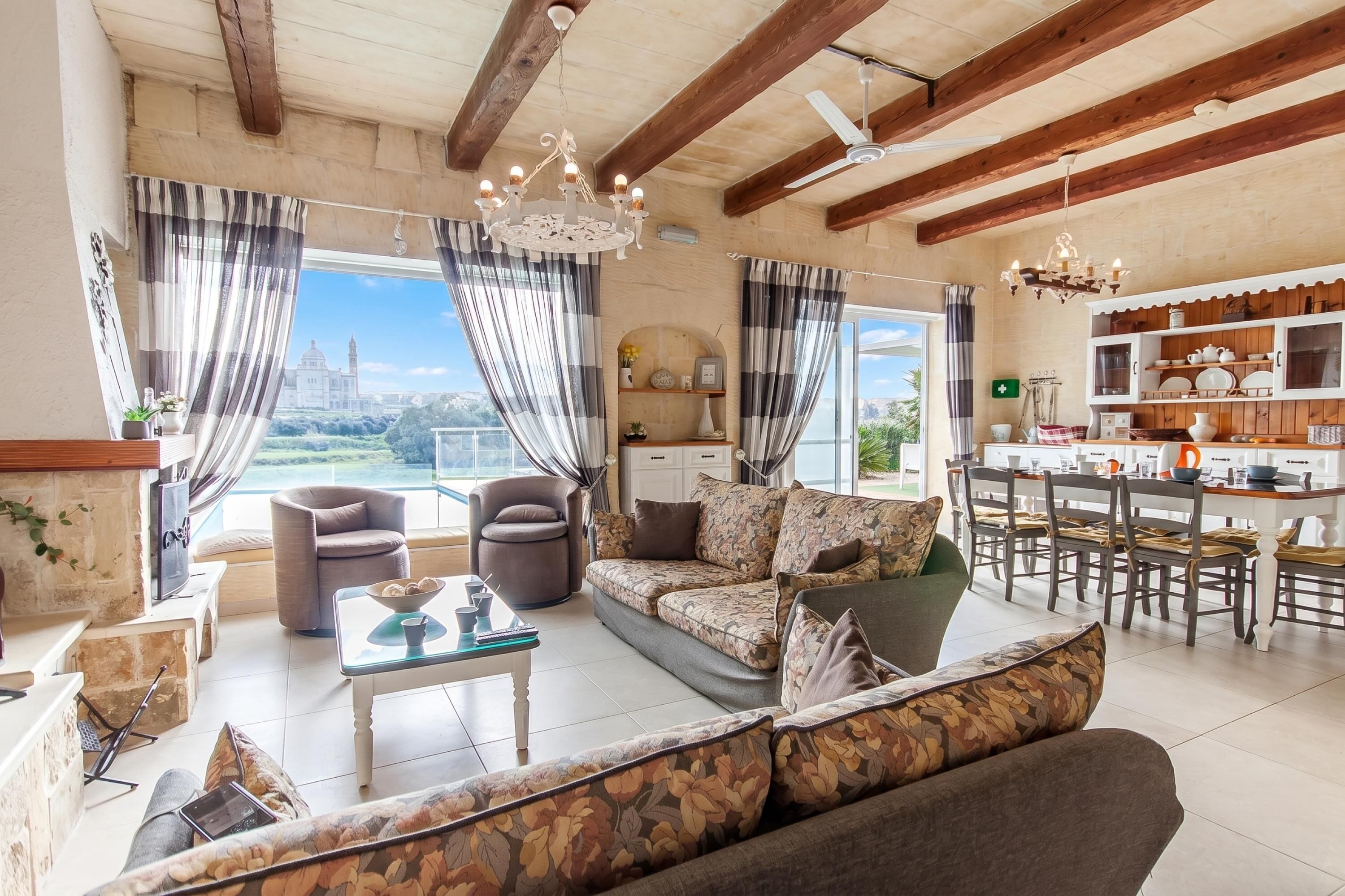 Family House, Multiple Bedrooms (Twilight Gozitan Farmhouse With Pool) | Living area | 21-inch flat-screen TV with cable channels