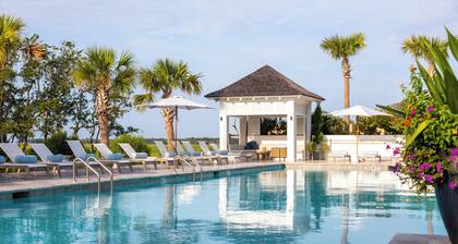 "Gone Coastal" 3 bedroom townhouse with community pool and fitness center