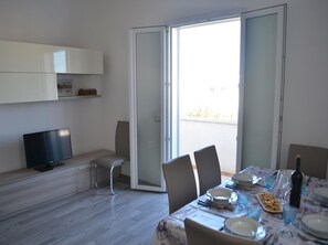 Apartment, 2 Bedrooms, Balcony | Dining - Nicely Furnished Holiday Home in San Foca a few Steps From Ll78 Beach (Melendugno)
