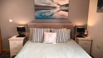 1 bedroom, desk, iron/ironing board, travel crib