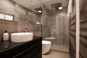 Badekar, hårføner, håndklær og såpe