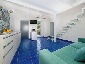 Panoramic-Haus | Wohnbereich | 32-Zoll-Flachbildfernseher mit Kabelempfang, Fernseher