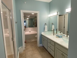 Shower, hair dryer, towels