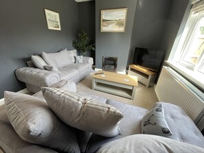 Ferienhaus | Wohnzimmer | Kamin