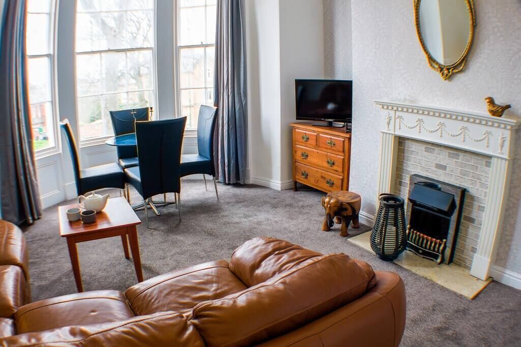 TV, fireplace, books