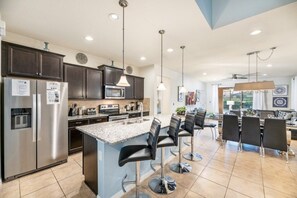 House, Multiple Bedrooms | Private kitchen | Dining tables - Phillipe's Windsor At Westside Vacation Home 7 Bedroom Home by Redawning (Kissimmee)