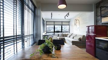 Deluxe Suite (Thea) | Living area | LED TV