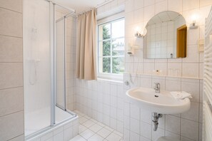 Double Room | Bathroom | Shower, hair dryer, towels, soap