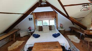 2 dormitorios, tabla de planchar con plancha, cuna de viaje