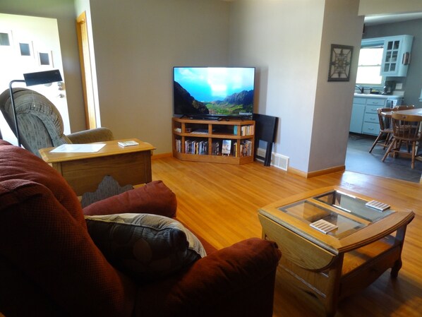 Smart TV, DVD player, foosball, books