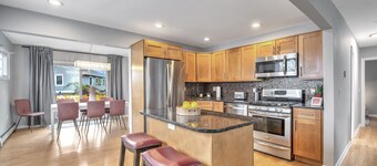 Spacious 4 BR house - One block from private beach w/ beach passes