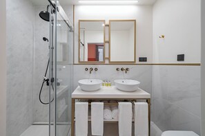 Shower, rainfall showerhead, towels