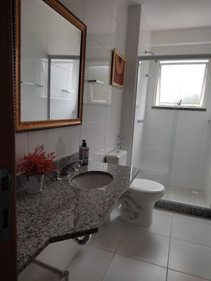 Shower, towels, toilet paper