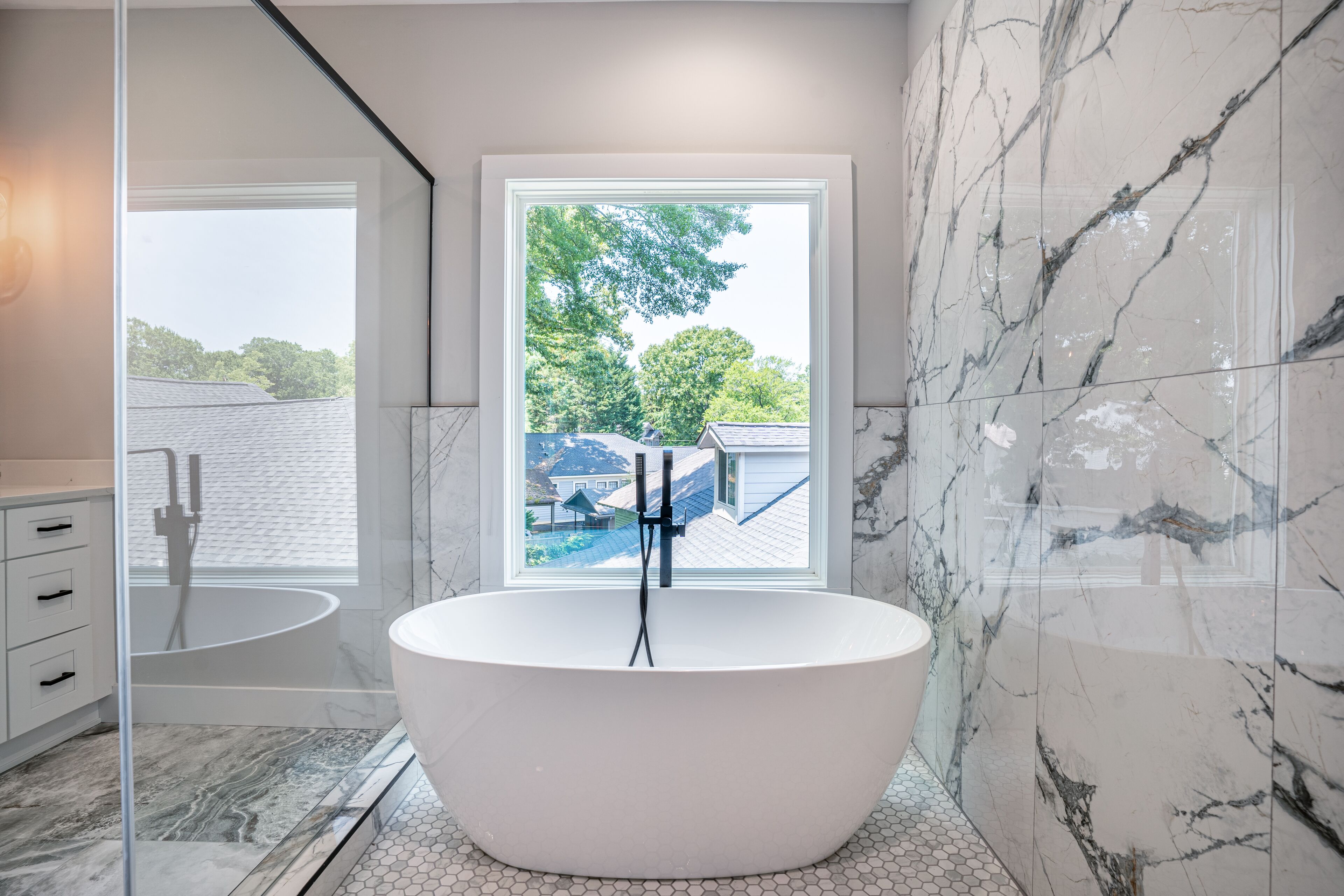 Combined shower/bathtub, towels, soap, toilet paper