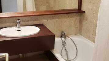 Combined shower/bathtub