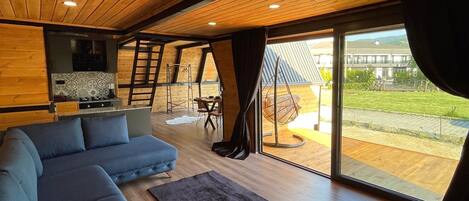 Honeymoon Bungalow | Living area | TV