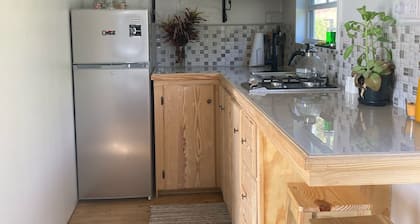 ComfyCabin is rustic with modern amenities, has deck with great view. Peaceful.