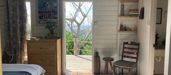 ComfyCabin is rustic with modern amenities, has deck with great view. Peaceful.