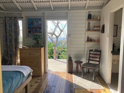 ComfyCabin is rustic with modern amenities, has deck with great view. Peaceful.