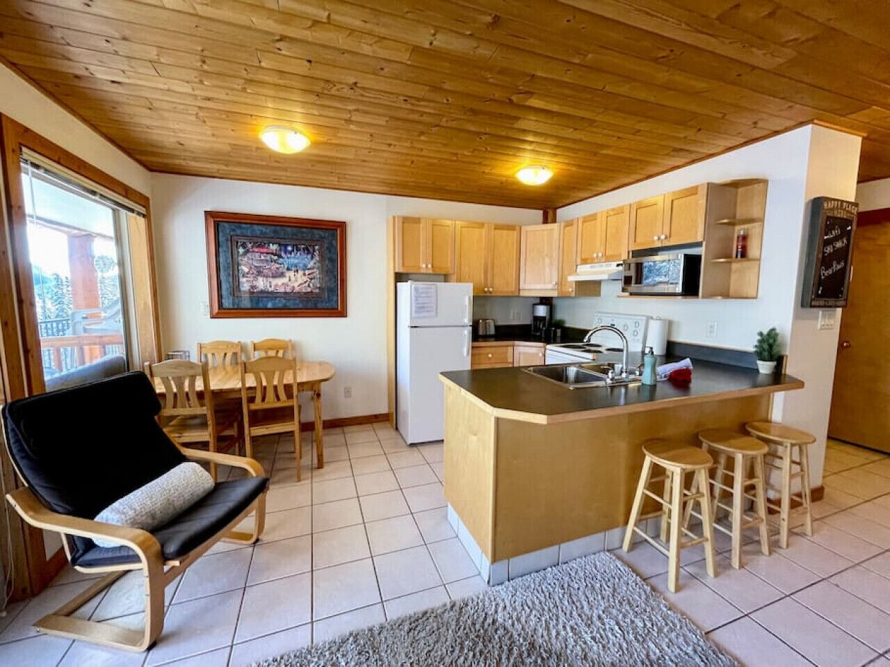 Fridge, coffee/tea maker, cookware/dishes/utensils