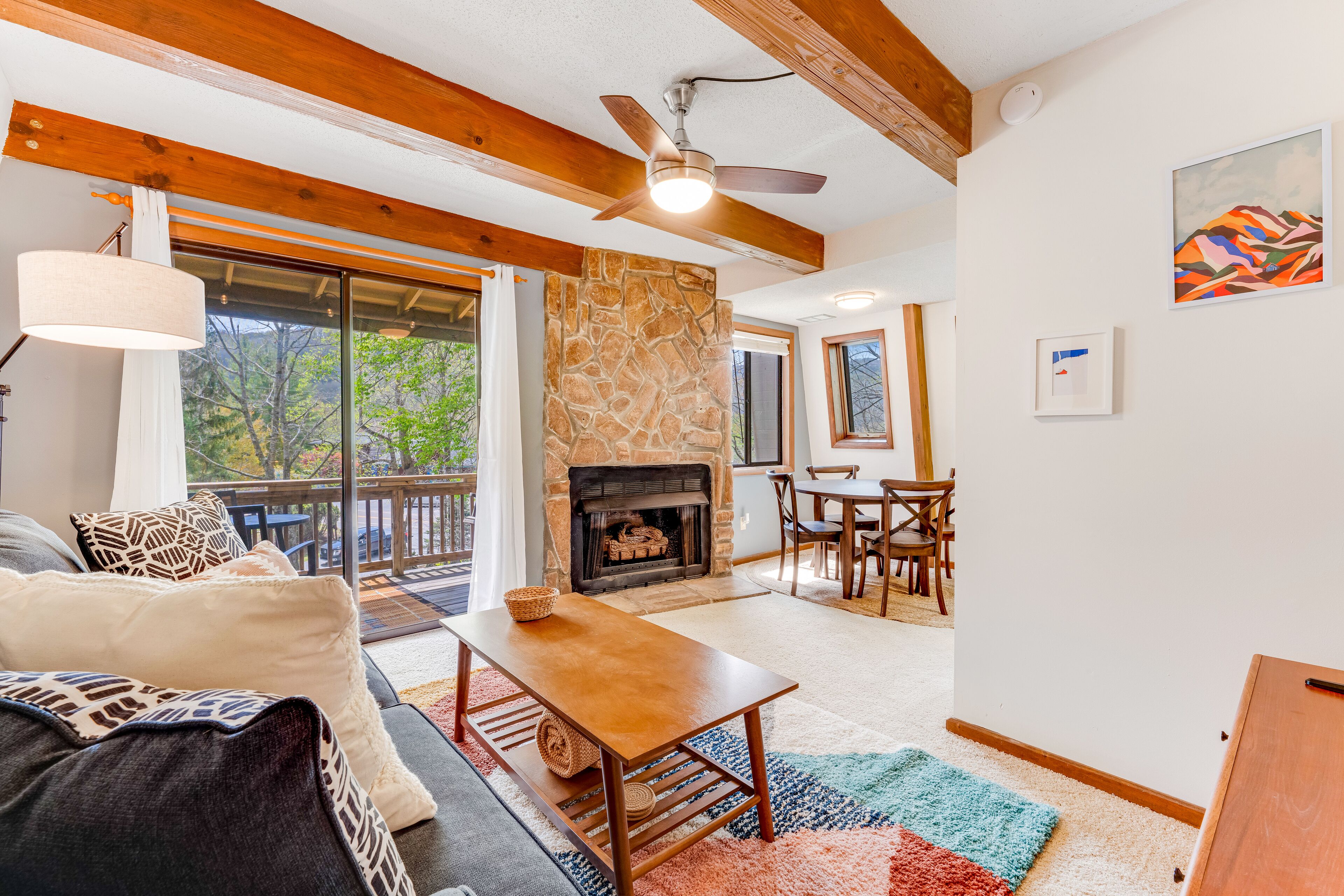 Mountain-view condo with fireplace & scenic balcony