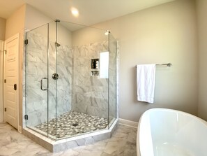 Combined shower/tub, hair dryer, towels, soap