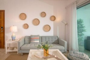 Apartment | Living area | 50-inch Smart TV with cable channels, TV, Netflix