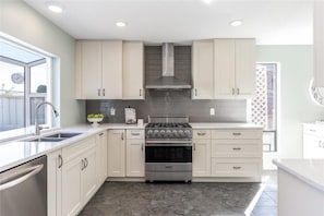 Fridge, microwave, oven, stovetop - OASIS RETREAT - FAMILY HOME WITH POOL IN GREAT LOCATION (West Kelowna)