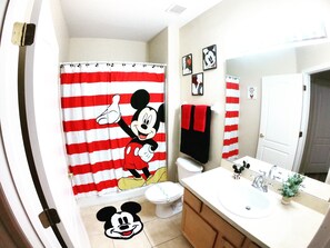 Combined shower/bathtub, hair dryer, towels, soap