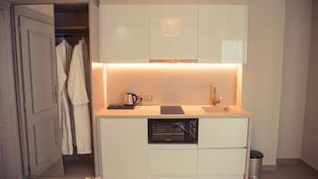 Mini-fridge, oven, stovetop, espresso maker