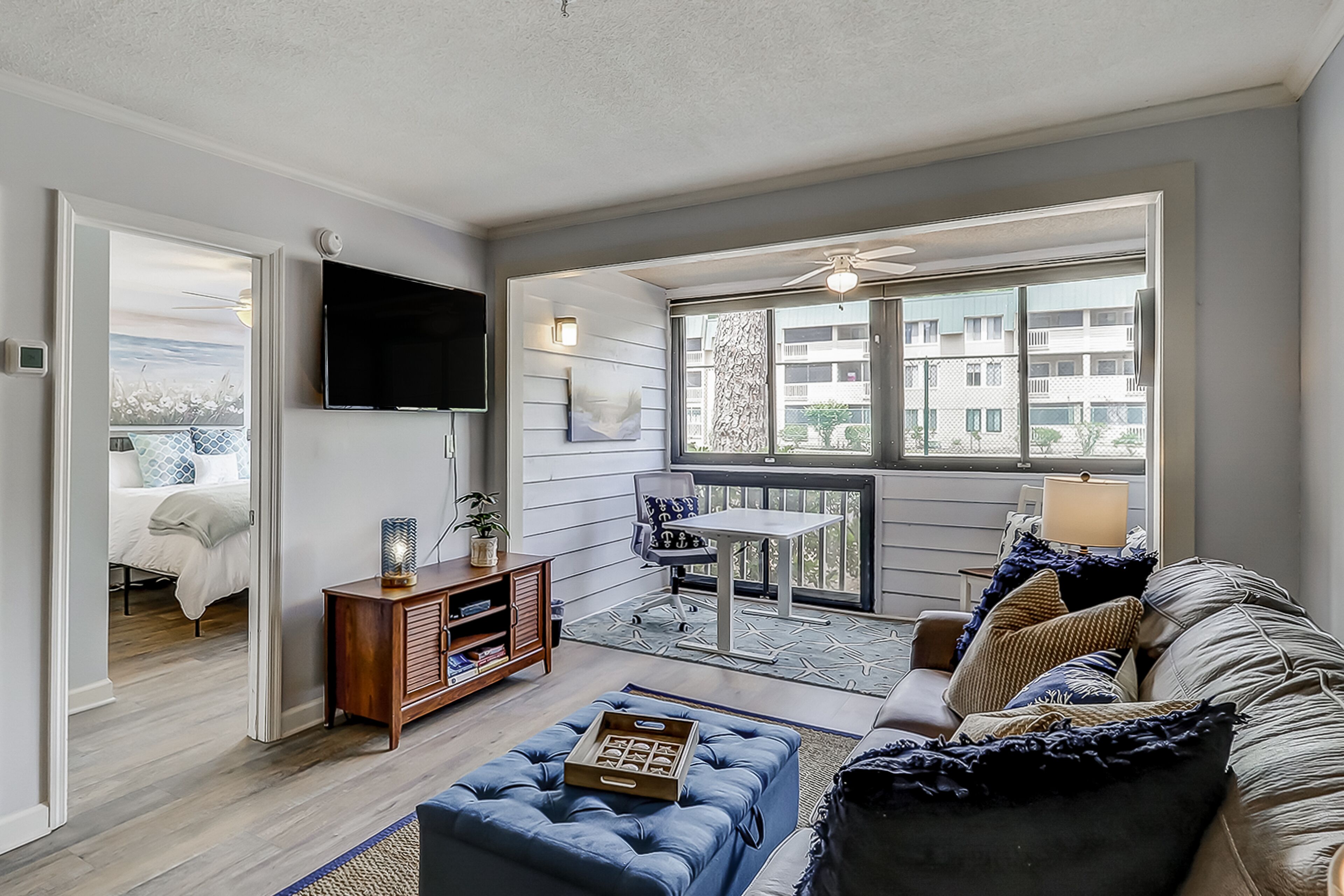 Gated resort condo with WiFi, AC, pools, hot tub, tennis, and beach access
