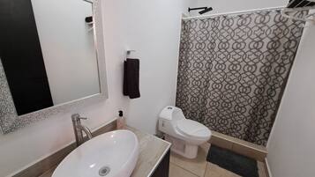 Shower, rainfall showerhead, towels