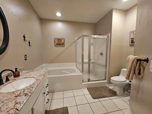 Combined shower/tub, hair dryer, towels, soap