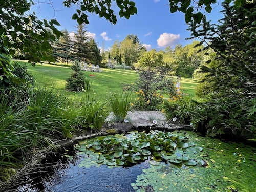 Warm Brook Farm | 1792 Vermont Farmhouse, Hot Tub, Koi Pond & Gardens