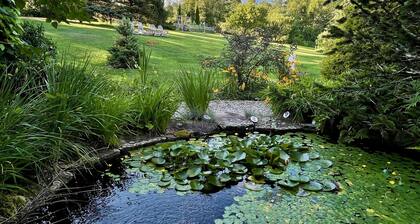 Warm Brook Farm | 1792 Vermont Farmhouse, Hot Tub, Koi Pond & Gardens
