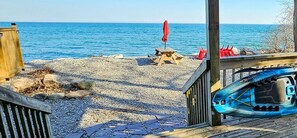 On the beach, sun-loungers