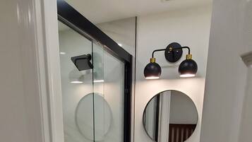 Bathtub, hair dryer, towels, soap