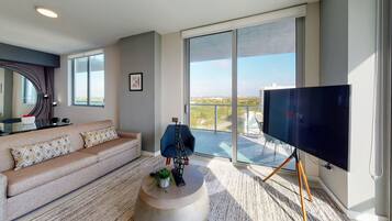 Panoramic Condo | Living area | 43-inch LED TV with cable channels, TV