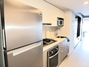 Fridge, microwave, oven, stovetop