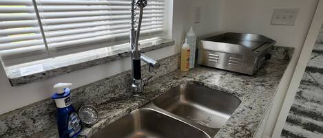 Fridge, microwave, stovetop, coffee/tea maker