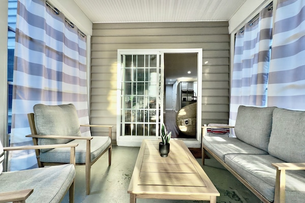3-seasons room with seating for 4 and storage as well as private entrance