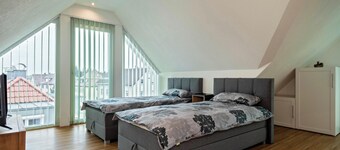 Apartamento vacacional 'Alpenblick' con vistas a la montaña, balcón y Wi-Fi