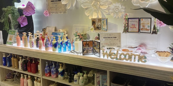 A display of various personal care products on shelves.