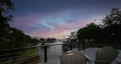 Lady of the Lake! Lake Front Property with Boathouse, Pet Friendly, Hot Tub, & Outdoor Sitting Area