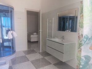 Chambre Deluxe Double ou avec lits jumeaux | Salle de bain