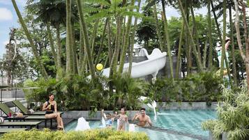 Outdoor pool, pool umbrellas, sun loungers