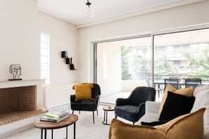 Smart TV, fireplace, books