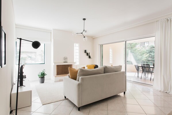 Smart TV, fireplace, books