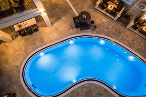 Outdoor pool, pool umbrellas - Griffon Kymi Hotel previously known as Valledi Village (Kymi-Aliveri)